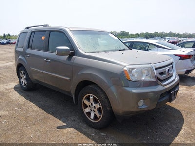 5FNYF489X9B****** · 2009 HONDA PILOT TOURING