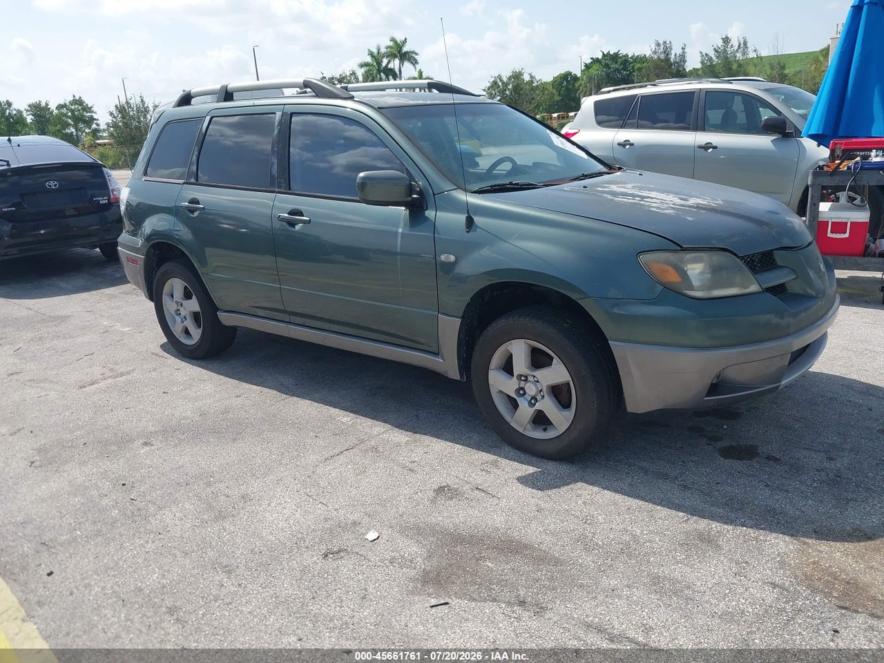 JA4LX41F24U****** · 2004 MITSUBISHI OUTLANDER XLS