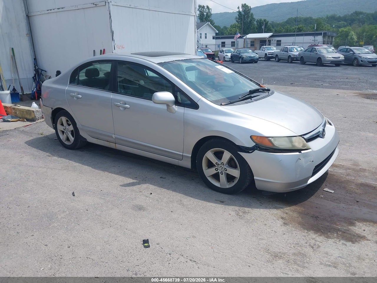 1HGFA168X6L****** · 2006 HONDA CIVIC EX
