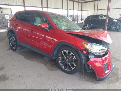 JM3KE2DY1G0****** · 2016 MAZDA CX-5 GRAND TOURING