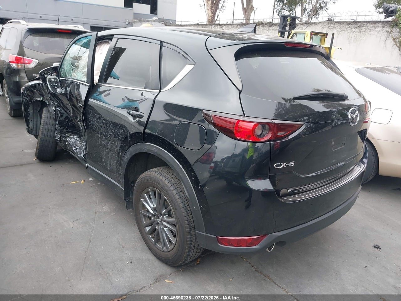 JM3KFACM4M0****** · 2021 MAZDA CX-5 TOURING · 3/11