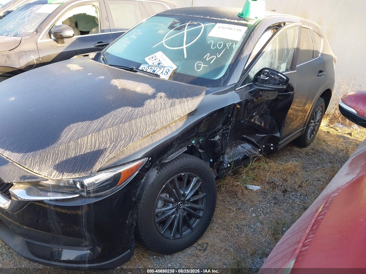 JM3KFACM4M0****** · 2021 MAZDA CX-5 TOURING · 2/11