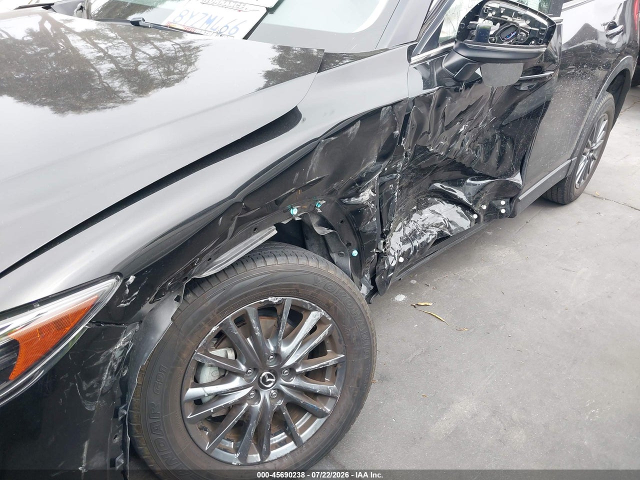 JM3KFACM4M0****** · 2021 MAZDA CX-5 TOURING · 6/11