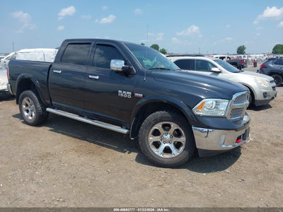 1C6RR7NTXFS****** · 2015 RAM 1500 LARAMIE