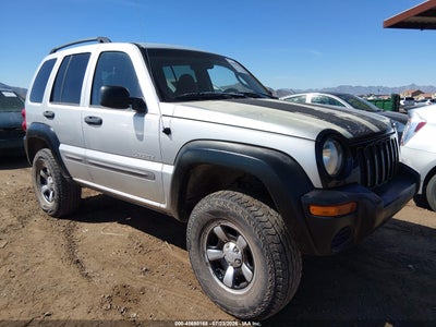 1J4GL48K34W****** · 2004 JEEP LIBERTY SPORT