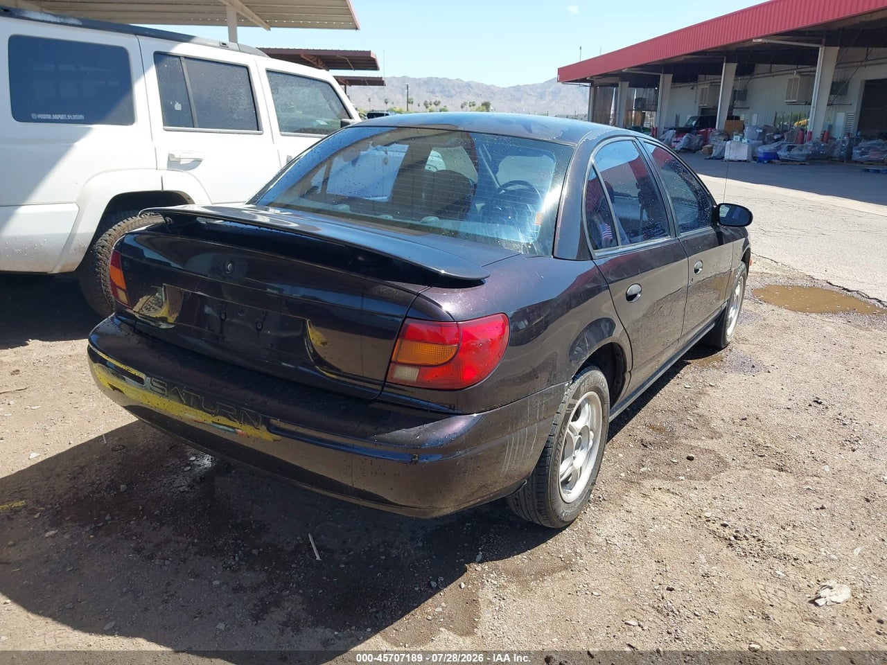 1G8ZG5287YZ****** · 2000 SATURN SL1 · 4/11