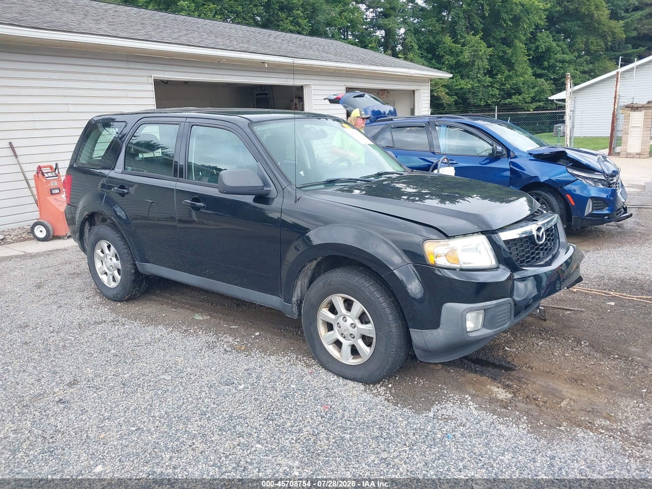 4F2CZ927X9K****** · 2009 MAZDA TRIBUTE I SPORT