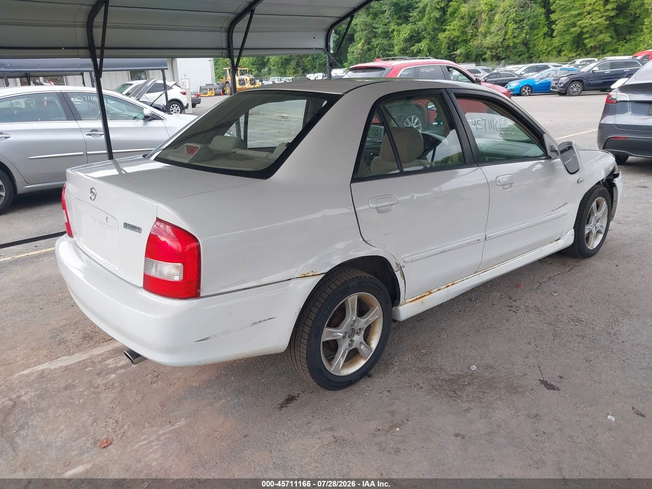 2003 MAZDA PROTEGE DX/ES/LX · 4/11