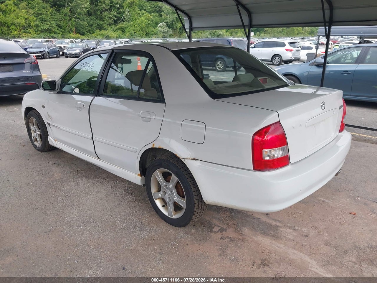 2003 MAZDA PROTEGE DX/ES/LX · 3/11