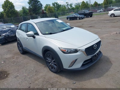 JM1DKFC74J0****** · 2018 MAZDA CX-3 TOURING