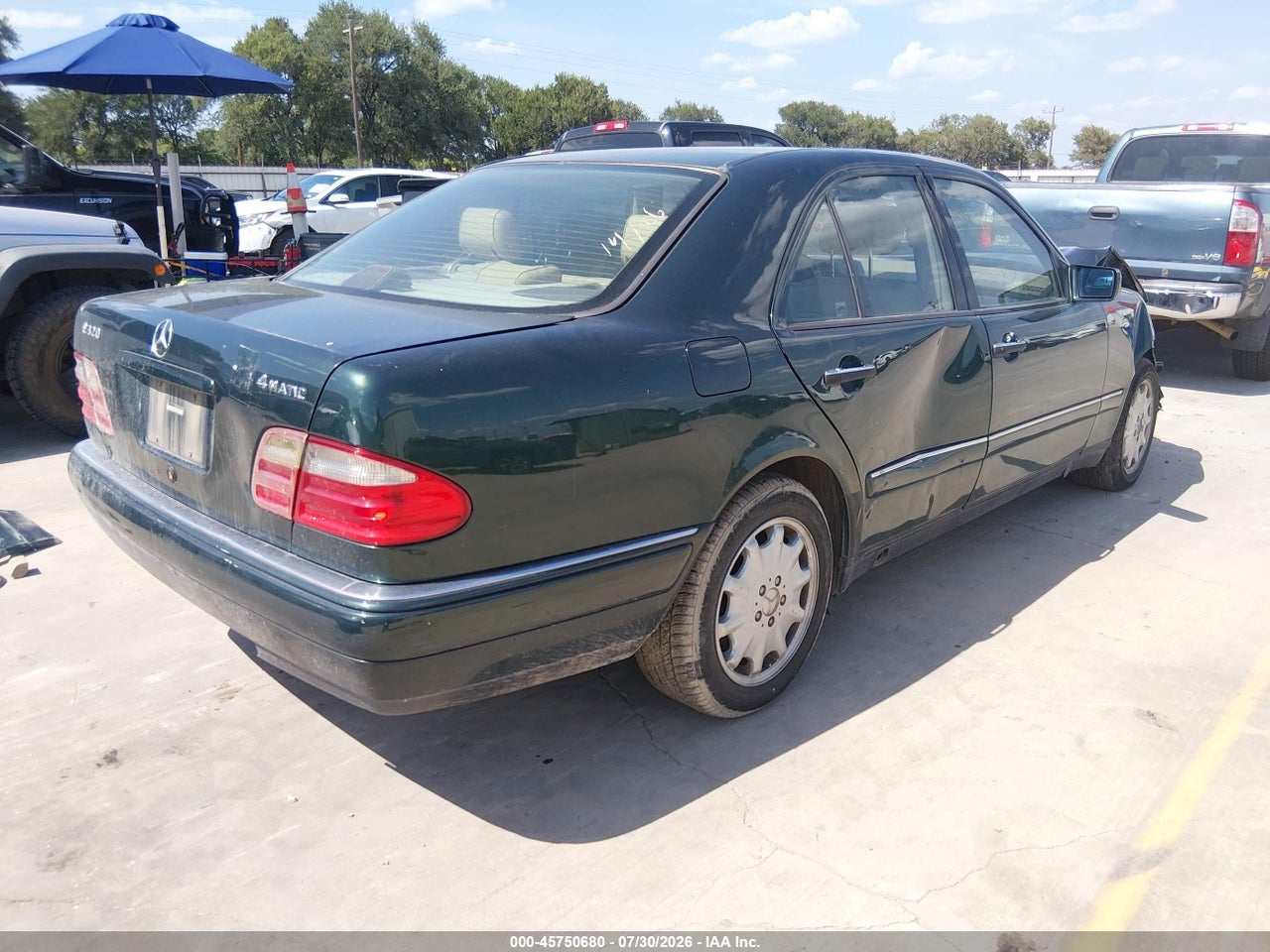 1998 MERCEDES-BENZ E 320 AWD · 4/11