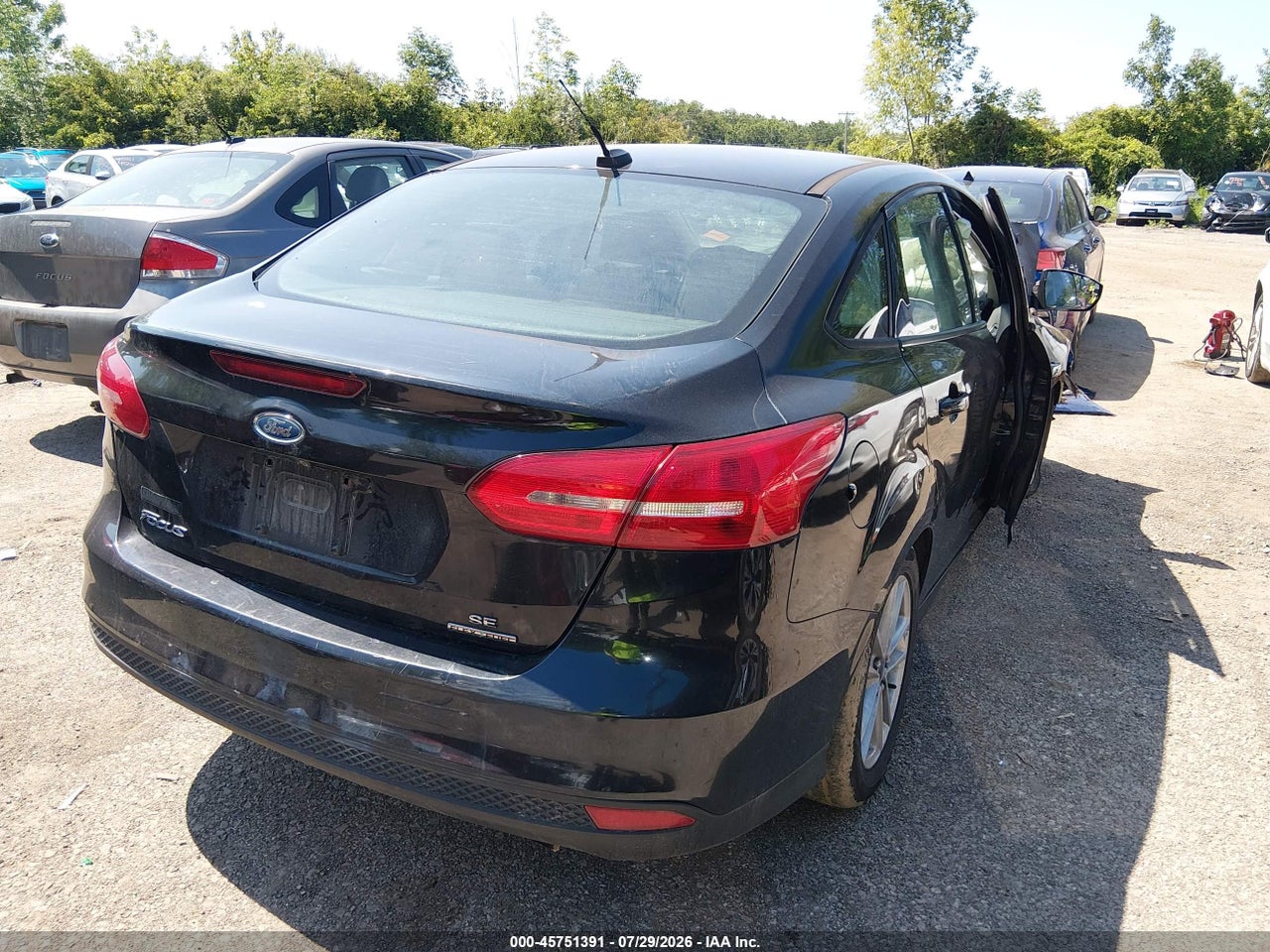 2015 FORD FOCUS SE · 4/11