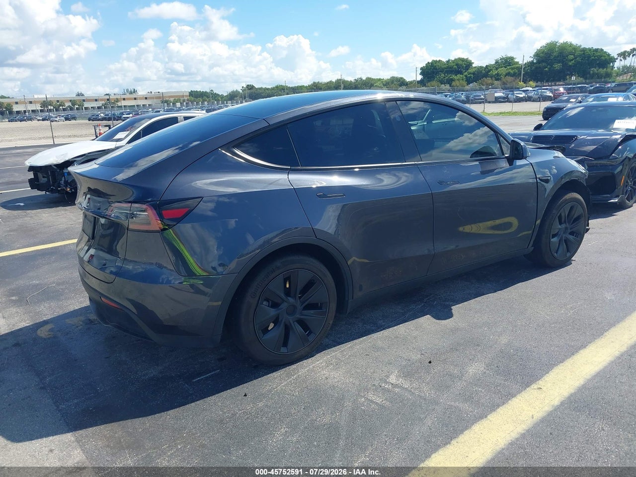 2024 TESLA MODEL Y   · 4/9