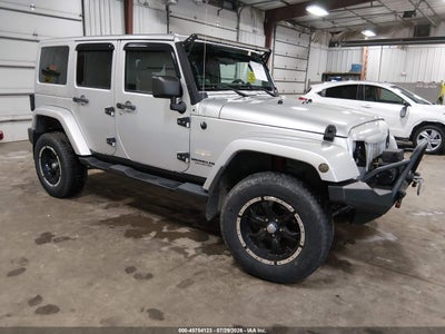 1C4HJWEGXCL****** · 2012 JEEP WRANGLER UNLIMITED SAHARA