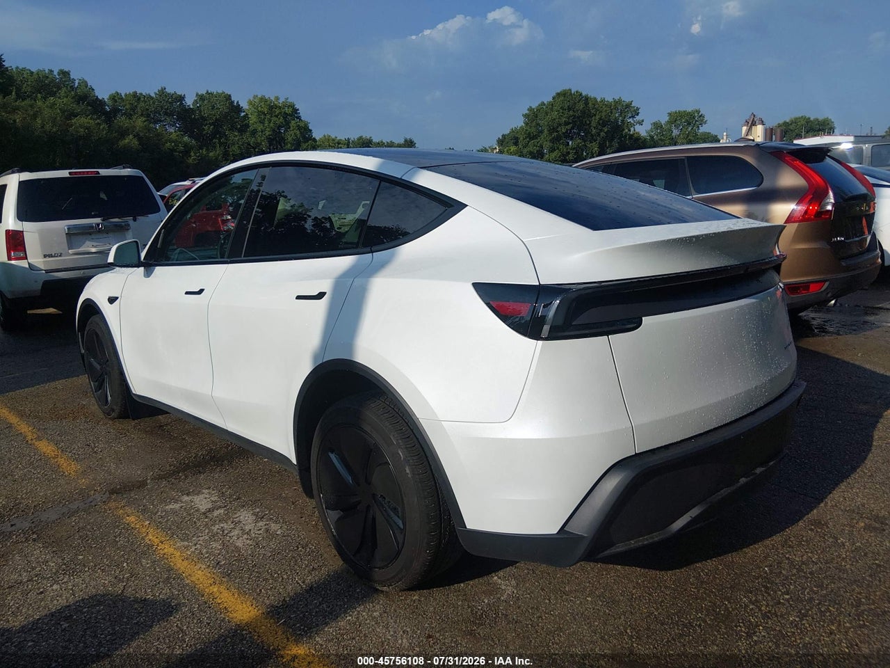 2026 TESLA MODEL Y ALL-WHEEL DRIVE/LONG RANGE LAUNCH SERIES/PREMIUM ALL-WHEEL DRIVE · 3/11