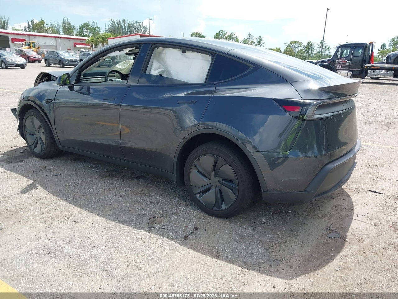 2026 TESLA MODEL Y   · 3/9