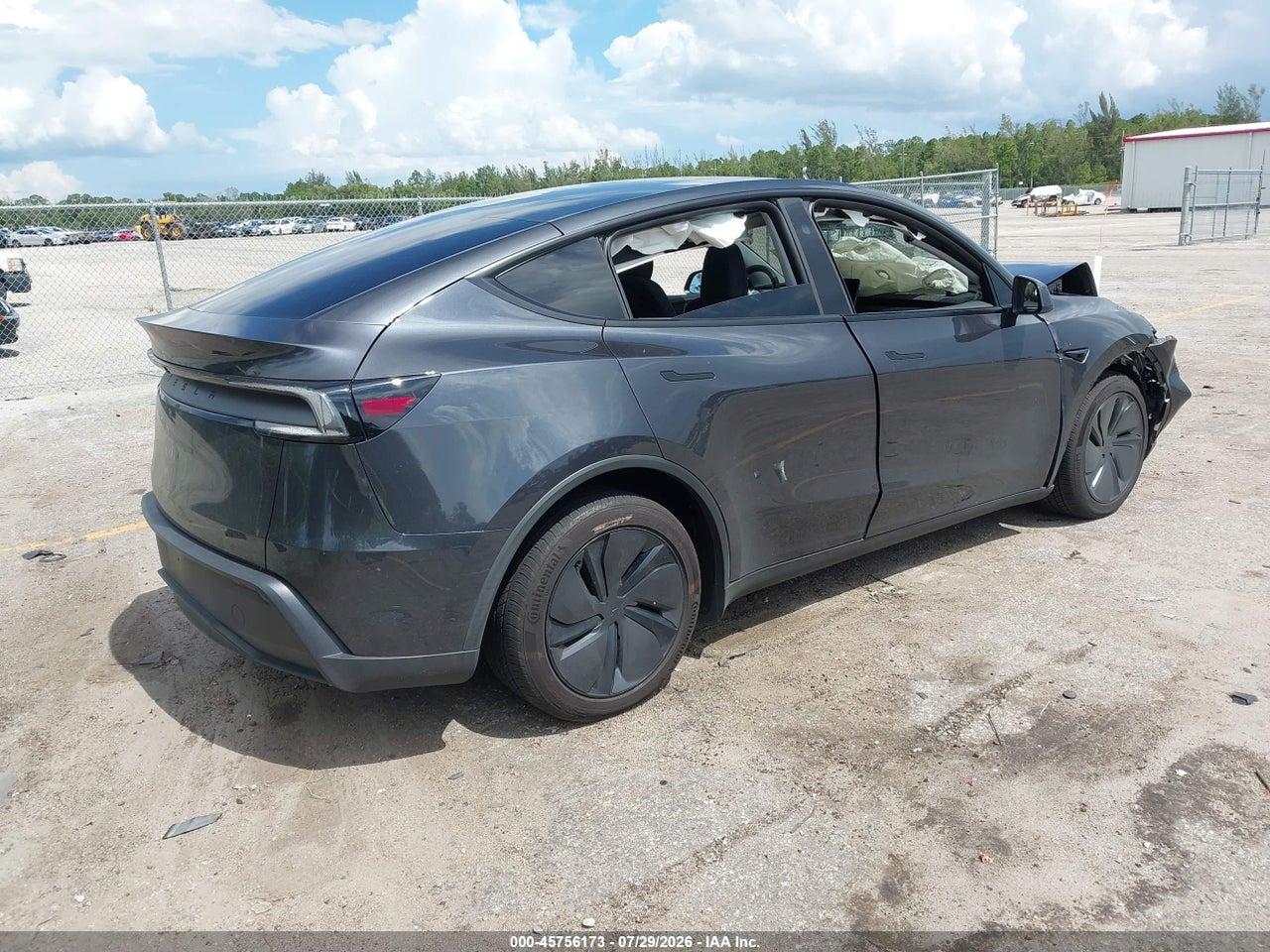 2026 TESLA MODEL Y   · 4/9