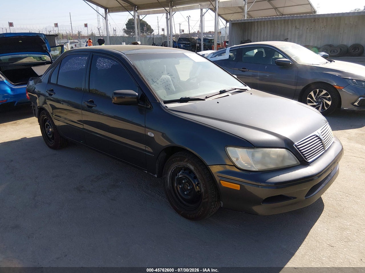 JA3AJ26E62U****** · 2002 MITSUBISHI LANCER ES