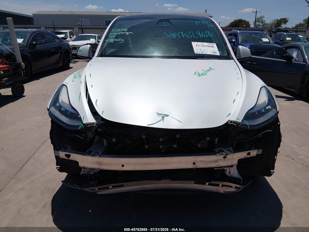 2023 TESLA MODEL Y · 6/11