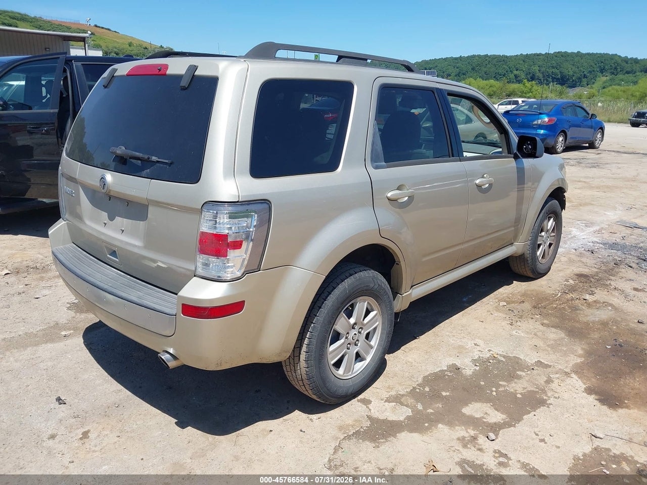 2010 MERCURY MARINER   · 4/11
