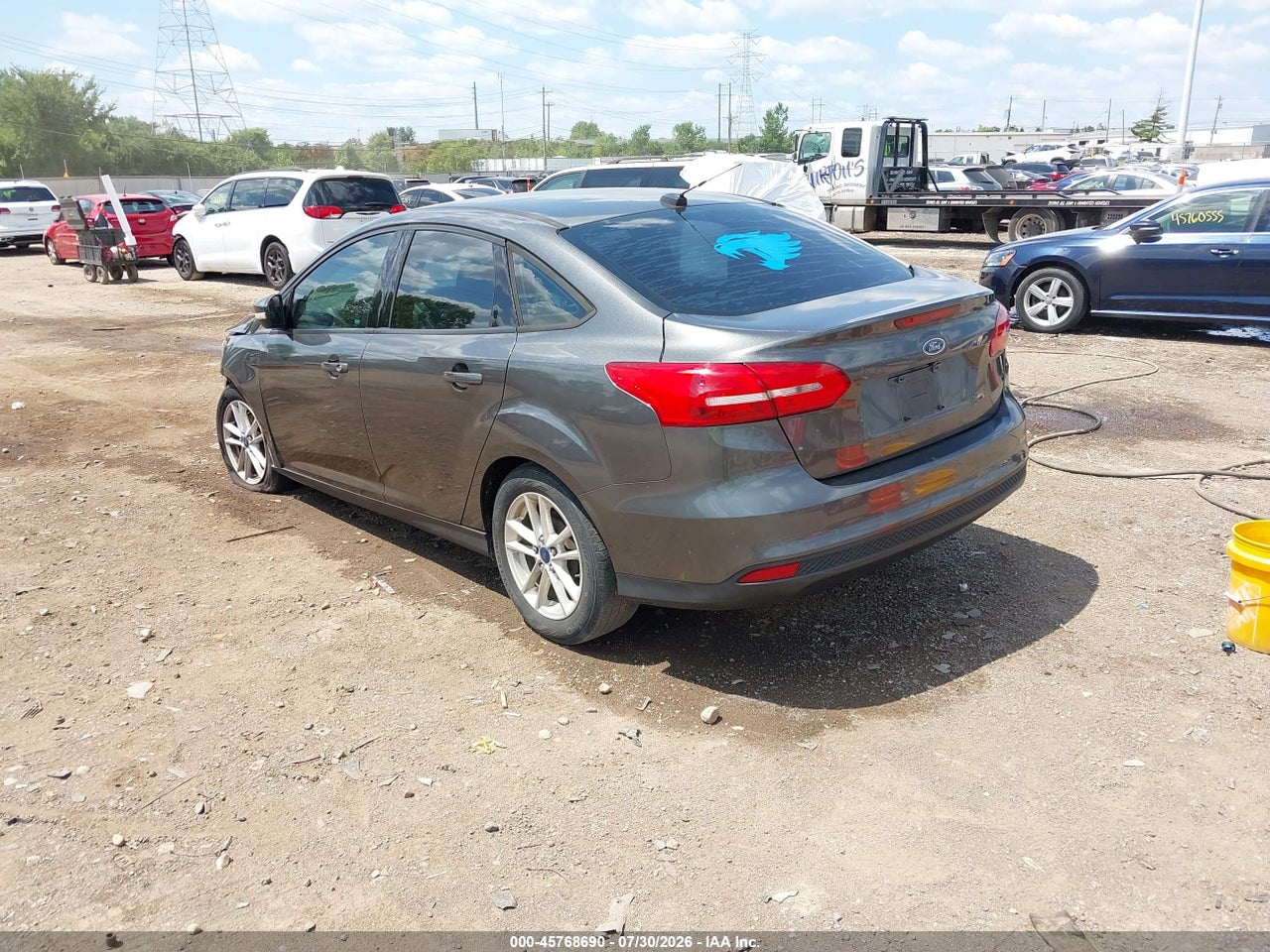 1FADP3F22FL****** · 2015 FORD FOCUS SE · 3/11