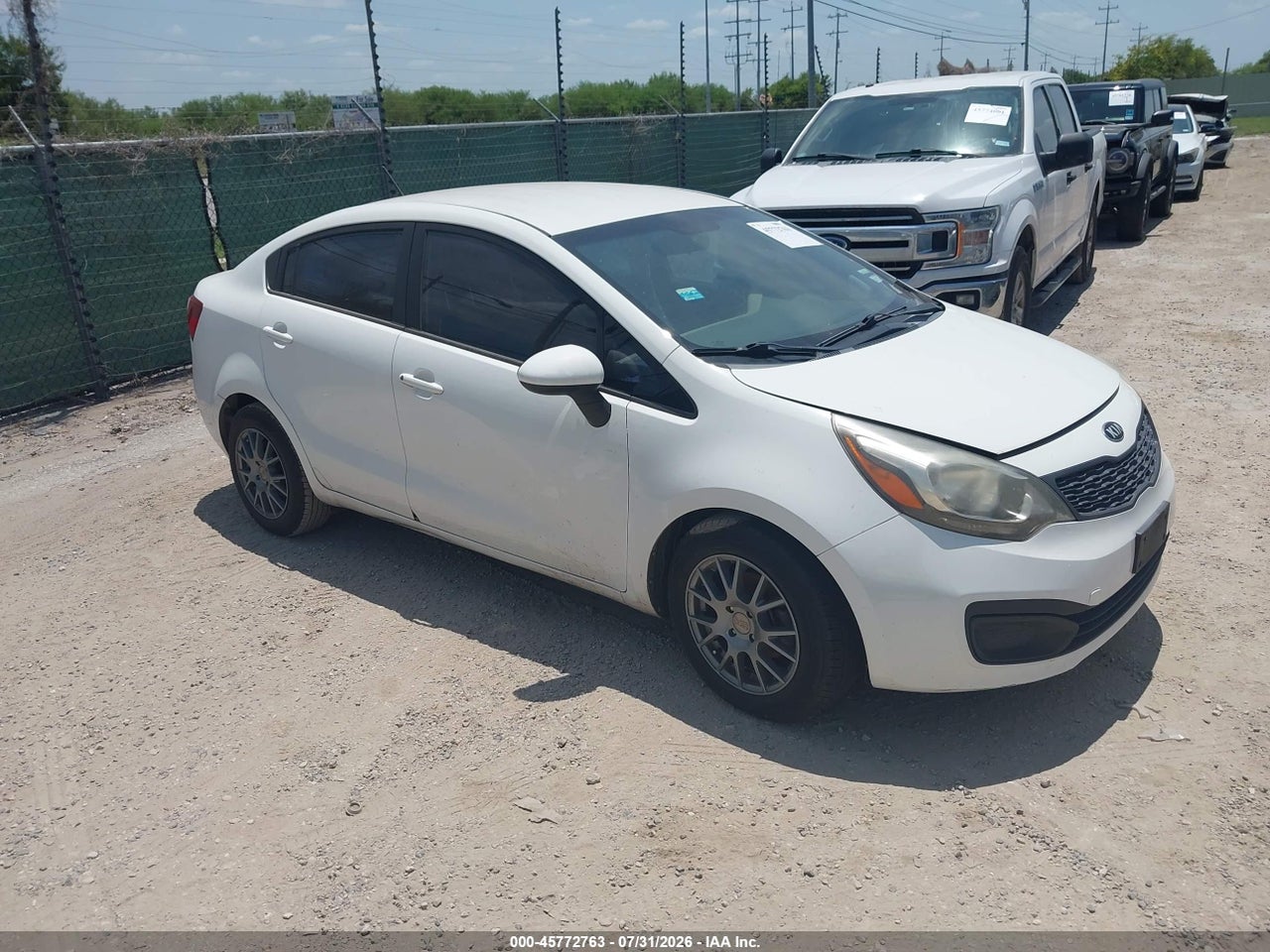 KNADM4A37E6****** · 2014 KIA RIO LX
