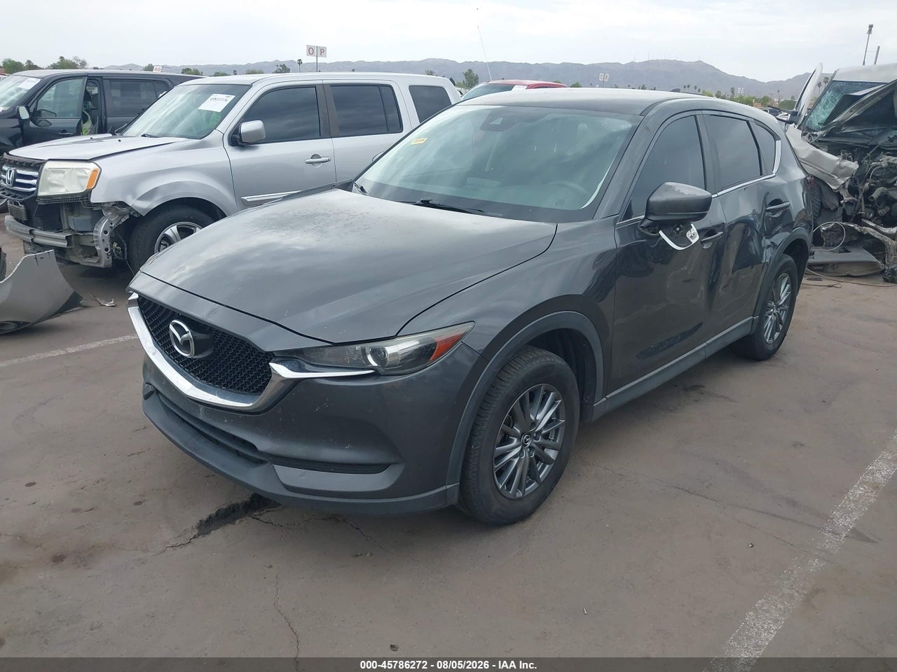 JM3KFACL8H0****** · 2017 MAZDA CX-5 TOURING · 2/11