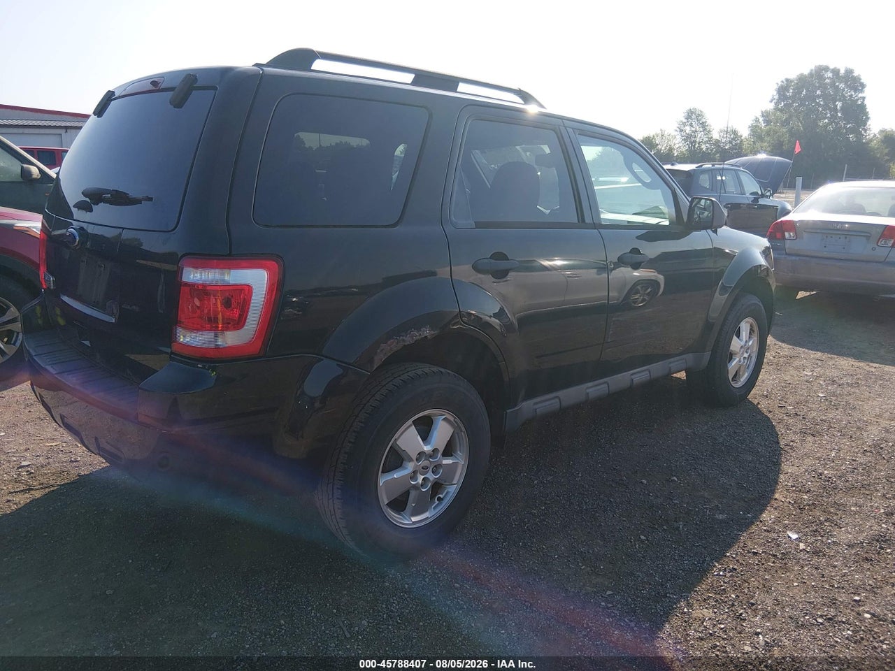 1FMCU0D75BK****** · 2011 FORD ESCAPE XLT · 4/11