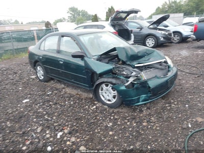1HGES165X2L****** · 2002 HONDA CIVIC LX