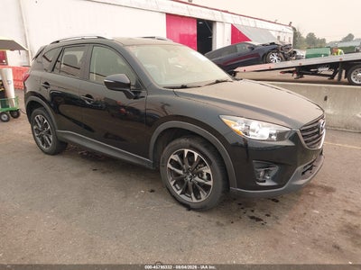 JM3KE4DY5G0****** · 2016 MAZDA CX-5 GRAND TOURING