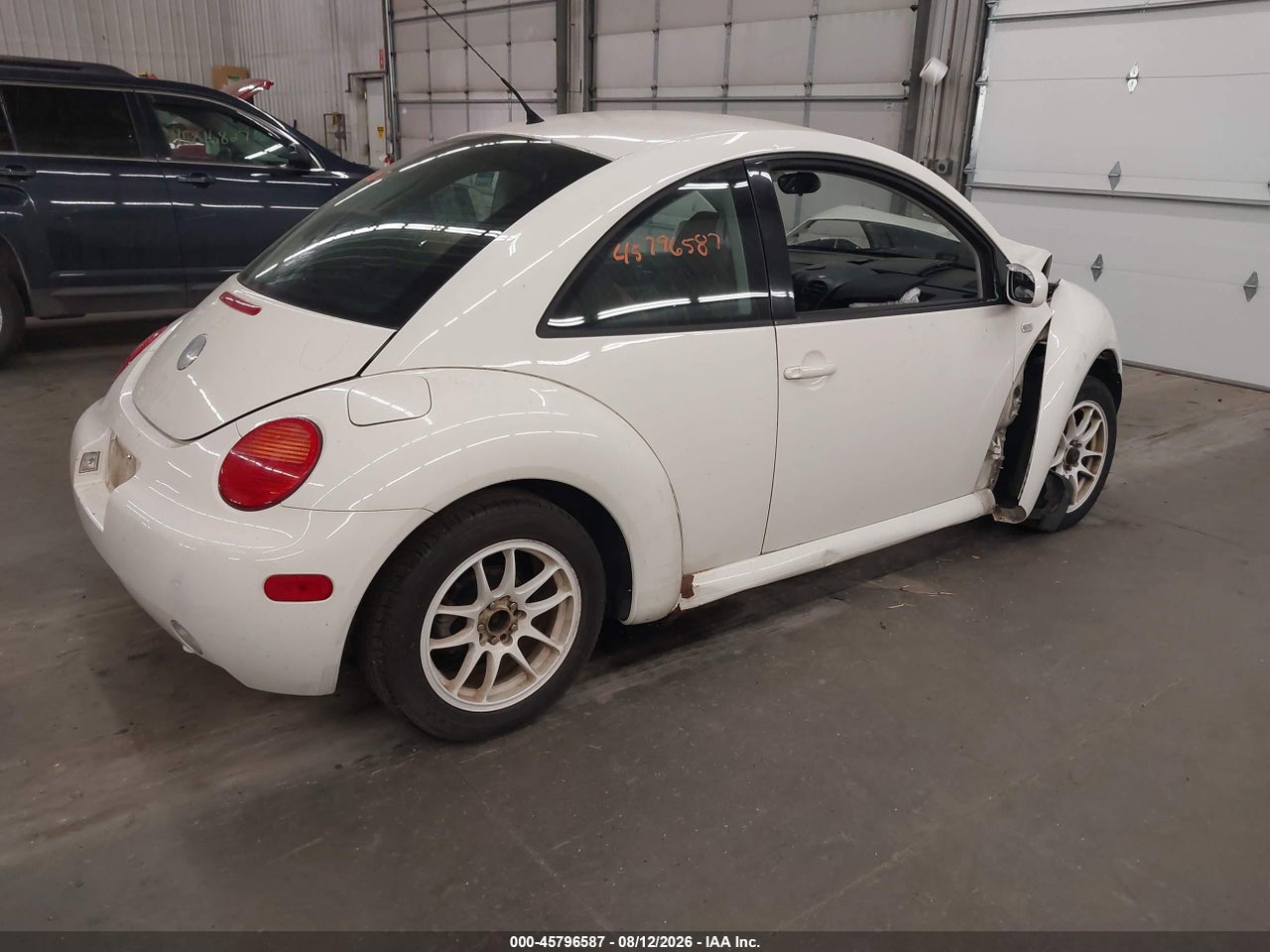 2003 VOLKSWAGEN NEW BEETLE GL · 4/11