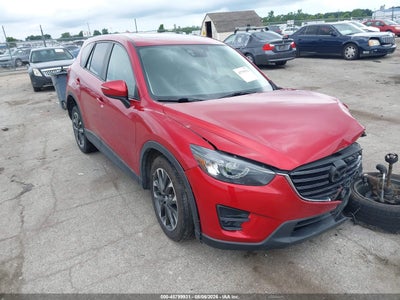 JM3KE2DY0G0****** · 2016 MAZDA CX-5 GRAND TOURING