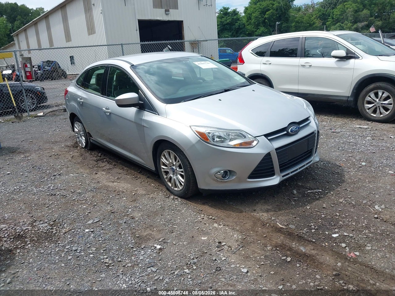 1FAHP3F24CL****** · 2012 FORD FOCUS SE