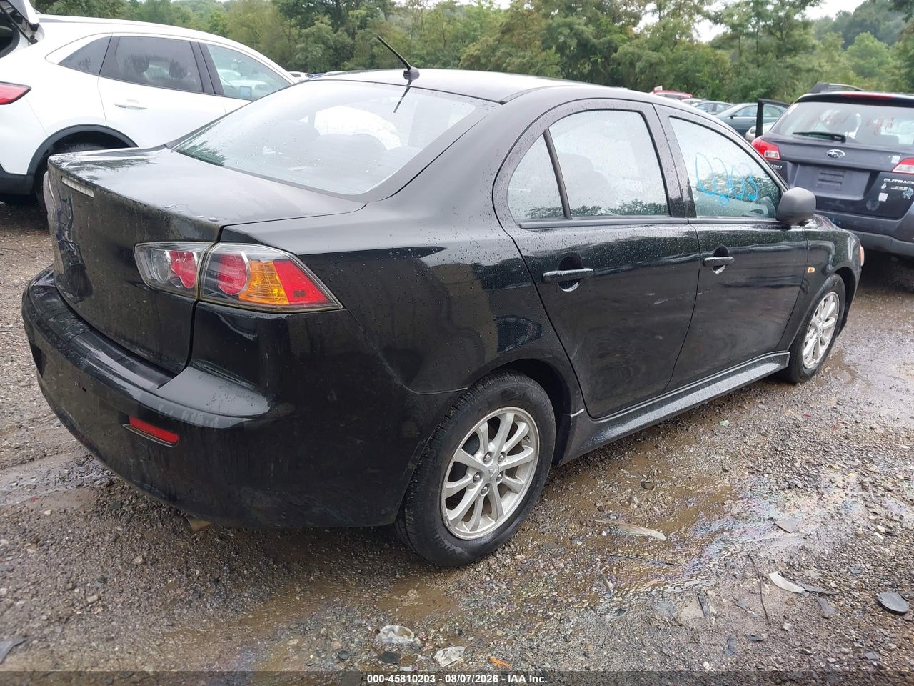 2012 MITSUBISHI LANCER ES · 4/11