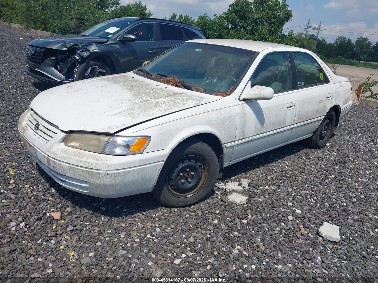 1997 TOYOTA CAMRY LE · 2/11