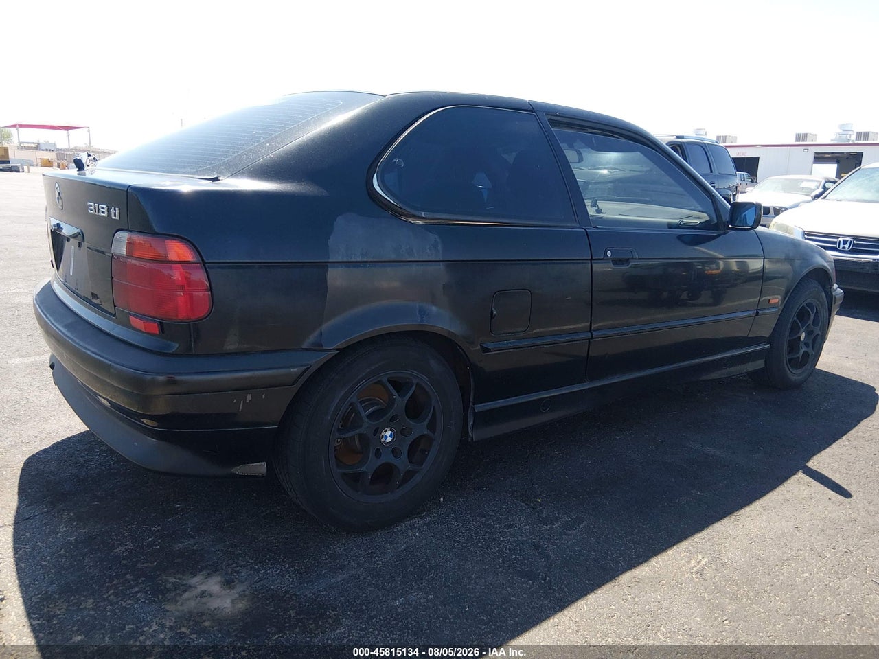 1997 BMW 318TI · 4/11