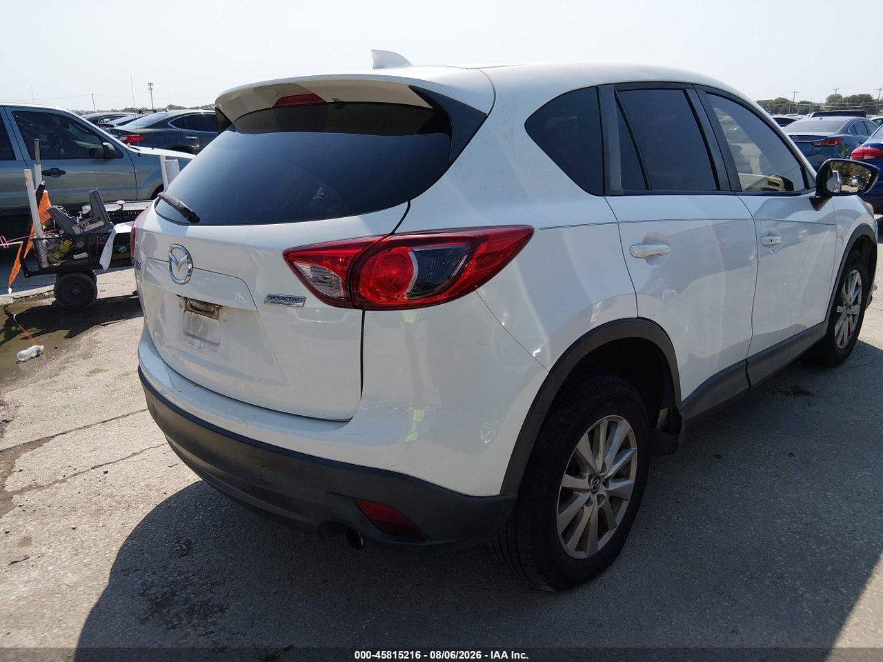 JM3KE2CY7F0****** · 2015 MAZDA CX-5 TOURING · 4/11