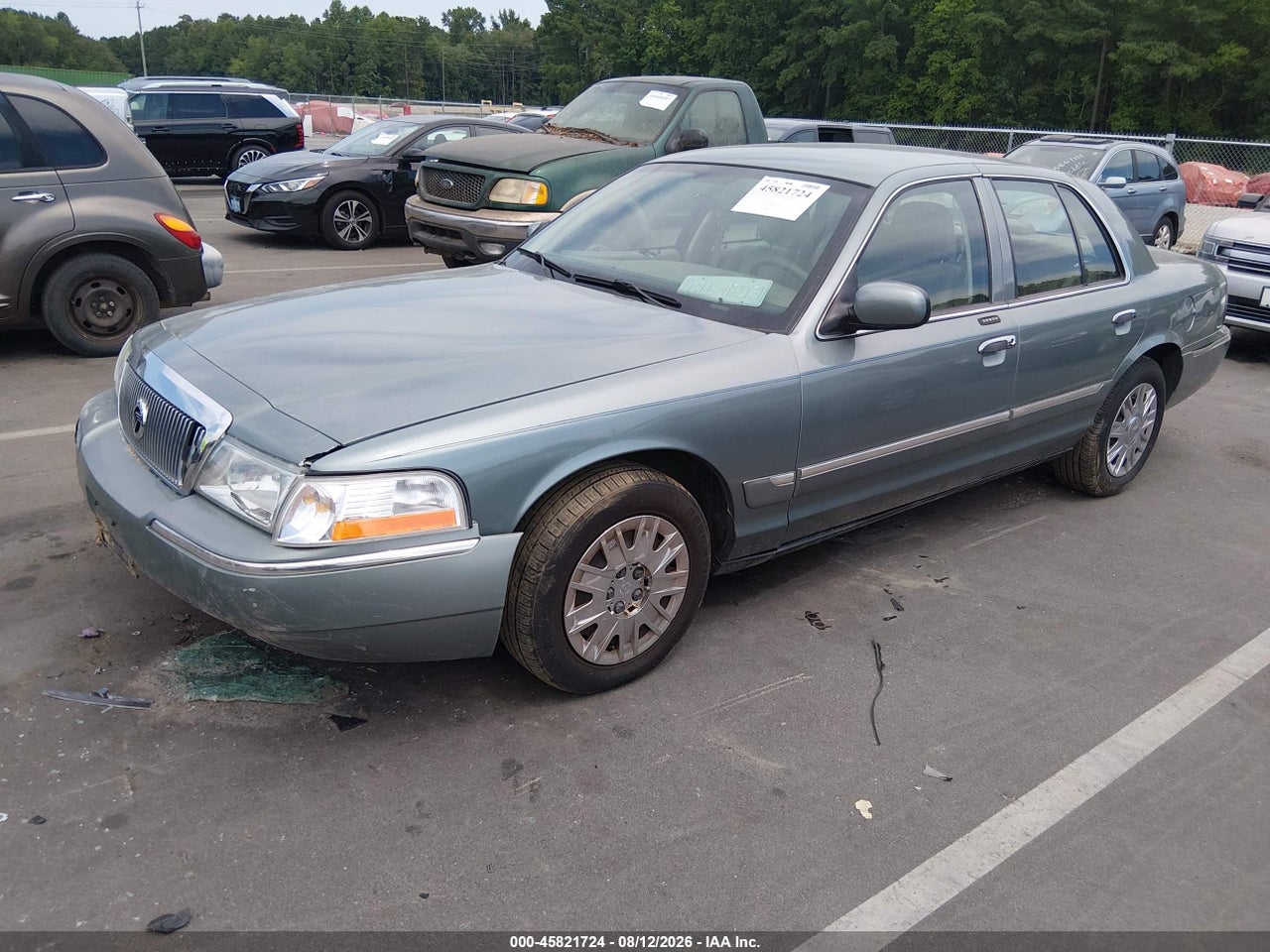 2MEFM74W55X****** · 2005 MERCURY GRAND MARQUIS GS · 2/6