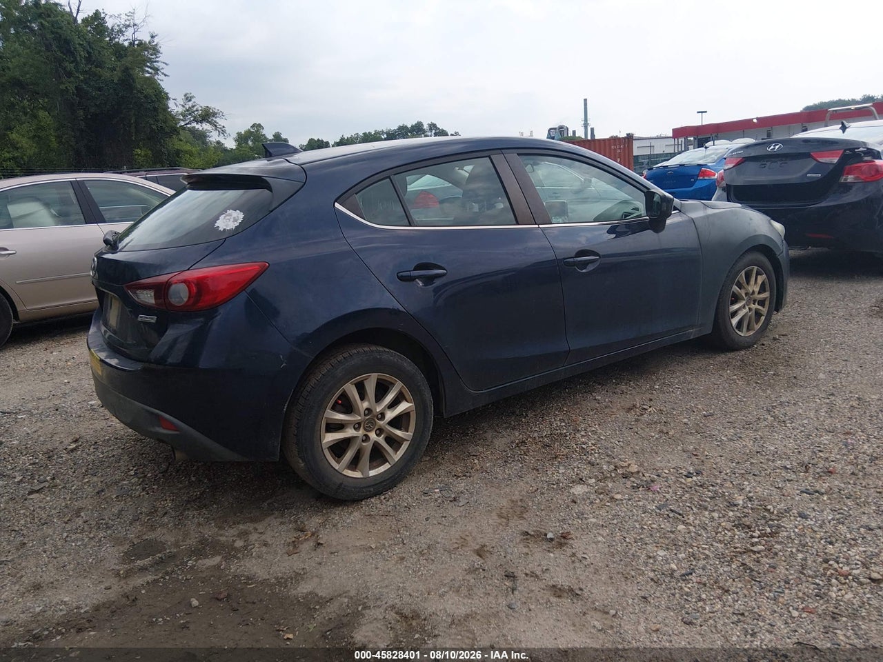 2015 MAZDA MAZDA3 I TOURING · 4/11
