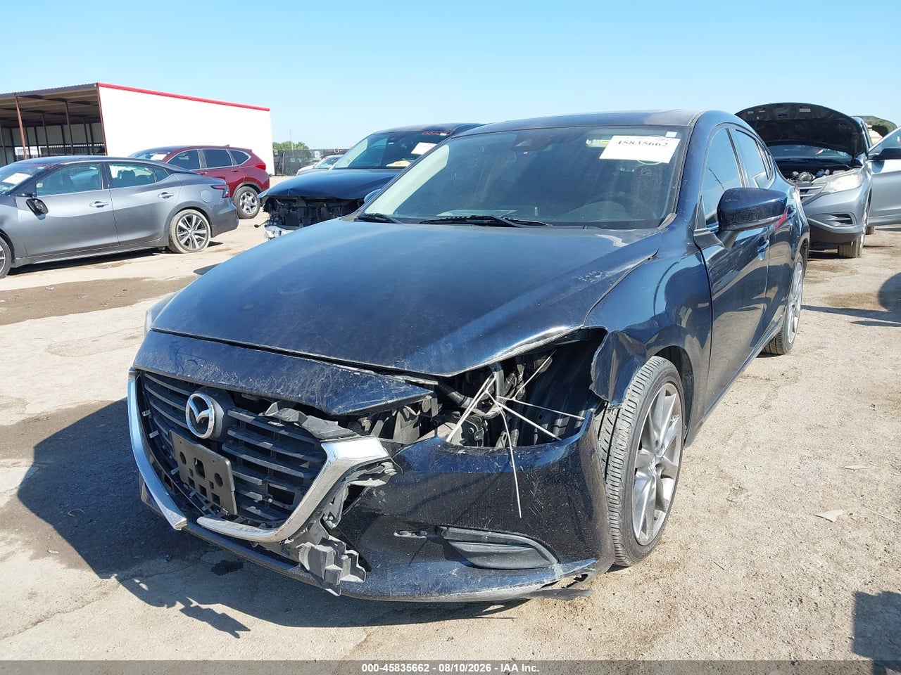 2018 MAZDA MAZDA3 TOURING · 2/11