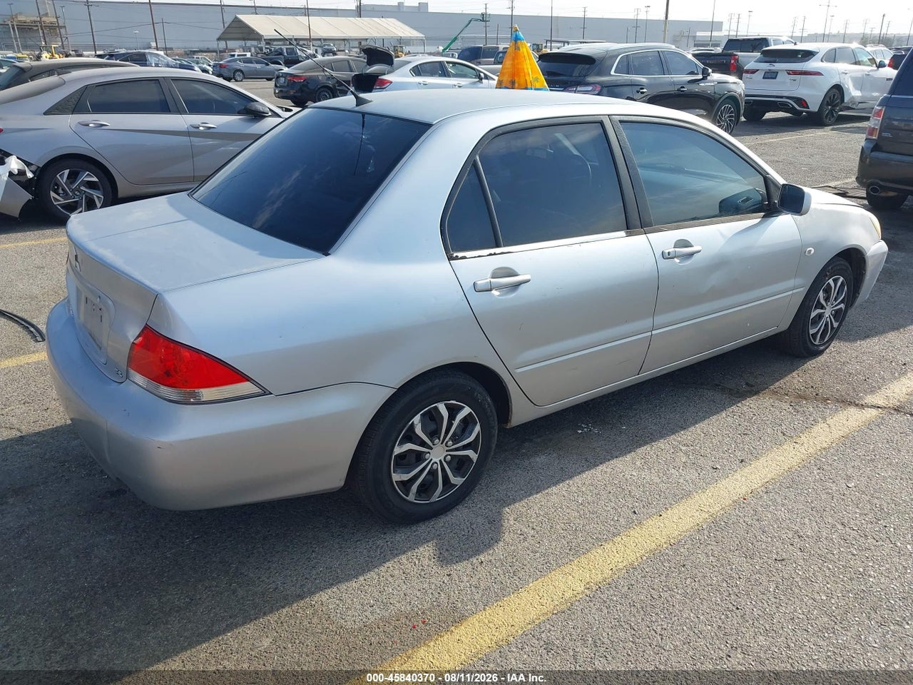 2005 MITSUBISHI LANCER ES · 4/11