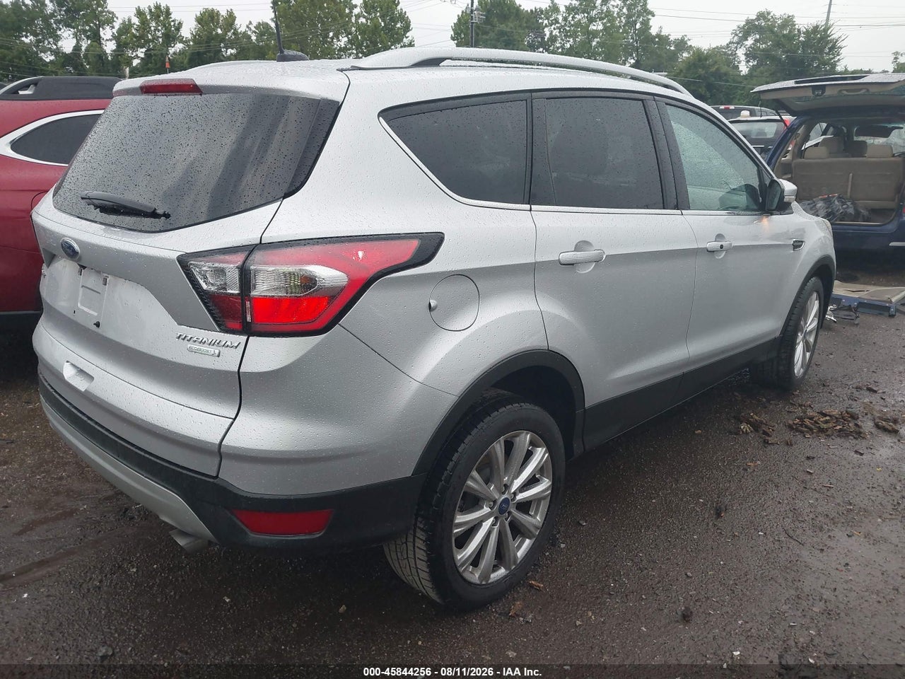 1FMCU0J92HU****** · 2017 FORD ESCAPE TITANIUM · 4/11