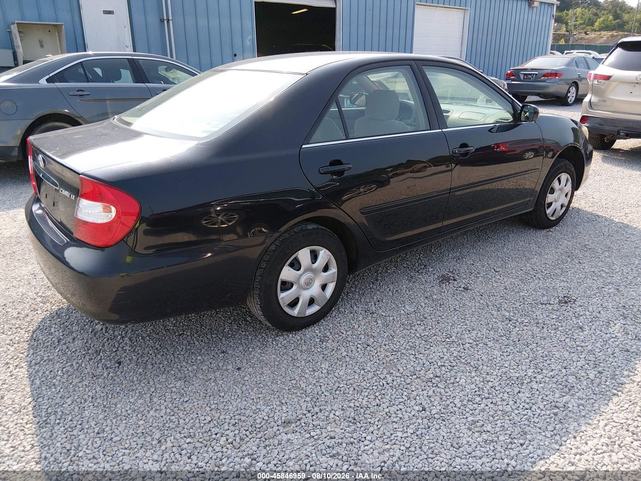 2004 TOYOTA CAMRY LE · 4/11