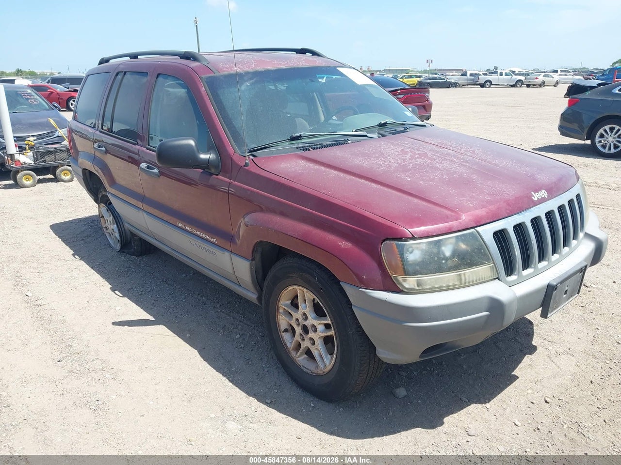 1J4GW48S42C****** · 2002 JEEP GRAND CHEROKEE LAREDO