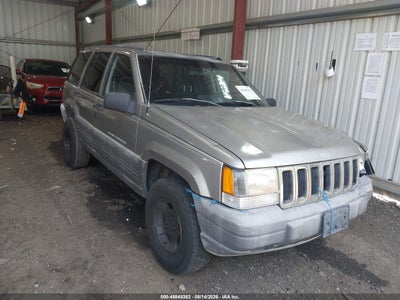 1J4GZ58S2WC****** · 1998 JEEP GRAND CHEROKEE LAREDO