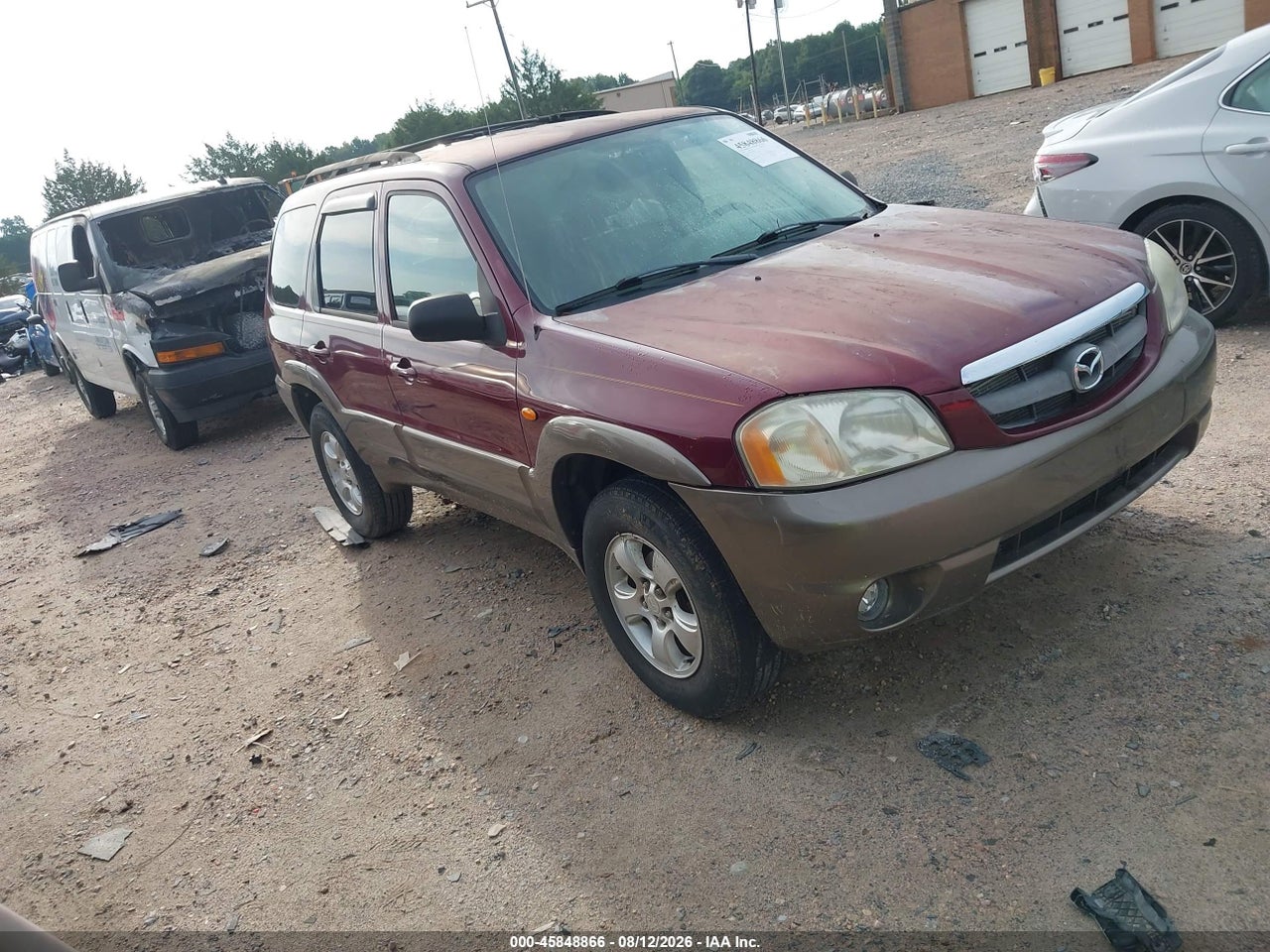 4F2CZ06124K****** · 2004 MAZDA TRIBUTE ES V6