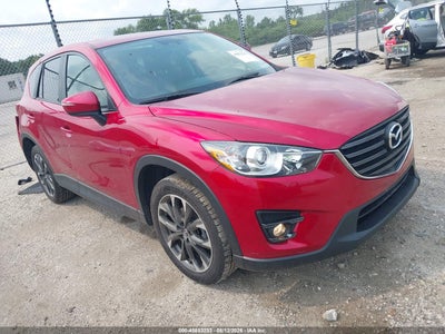 JM3KE4DY2G0****** · 2016 MAZDA CX-5 GRAND TOURING