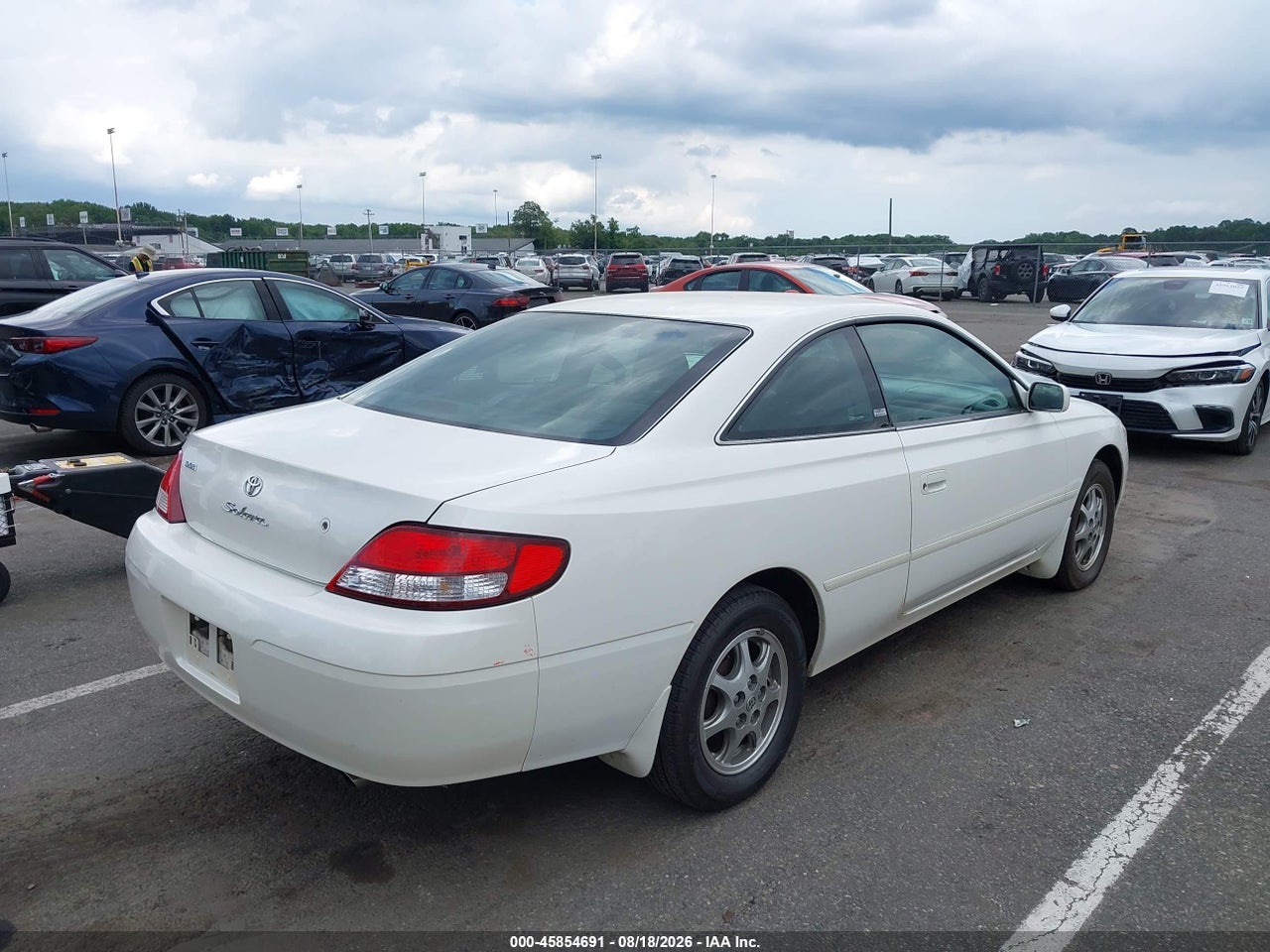 2T1CG22P4YC****** · 2000 TOYOTA CAMRY SOLARA SE · 4/11