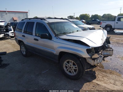 1J4GW48S34C****** · 2004 JEEP GRAND CHEROKEE LAREDO