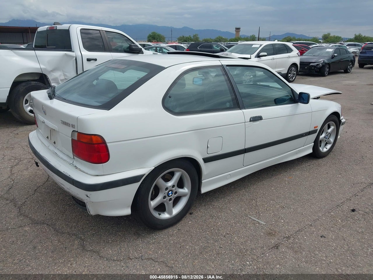 1998 BMW 318TI · 4/11